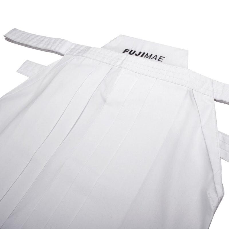 White Hakama FUJIMAE made of polyester and rayon blend, designed for comfort and lightweight martial arts practice.