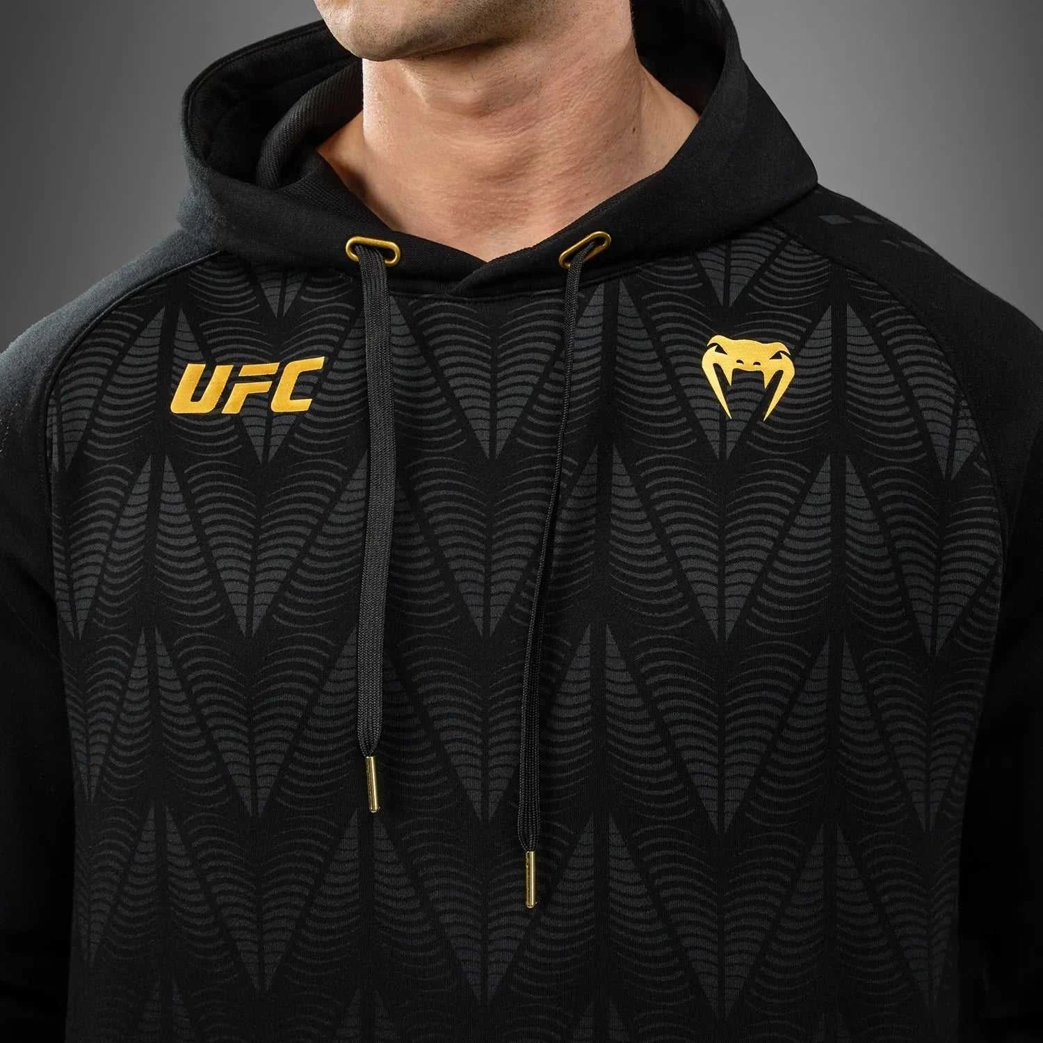 Hoodie Venum UFC Zenith Replica noir et or pour entraînement et lifestyle MMA