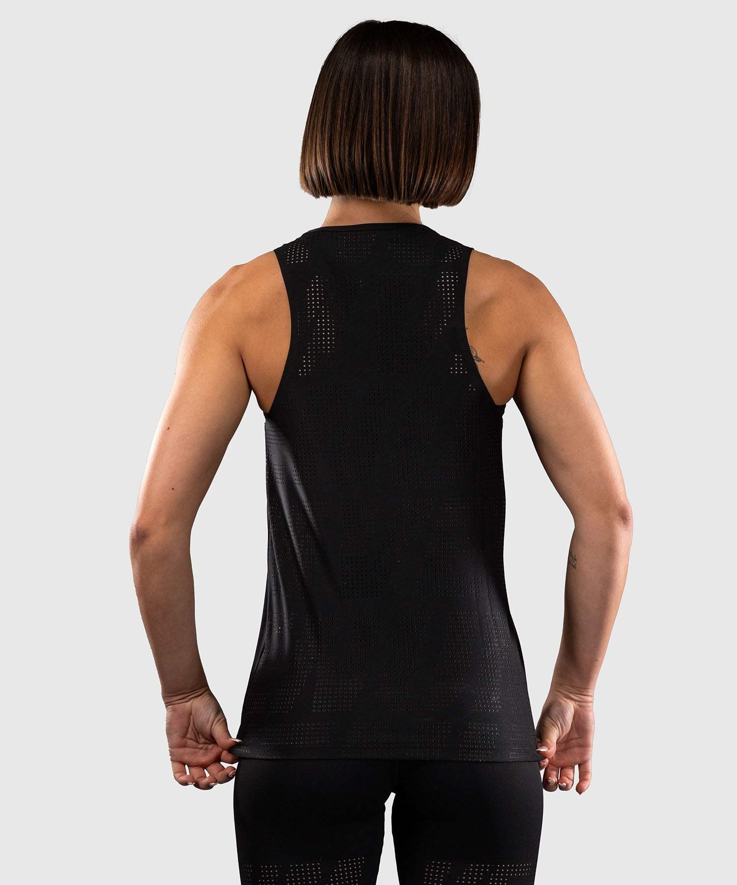 Débardeur femme Dry Tech Venum Lazer noir et jaune, coupe slim respirante pour fitness et training