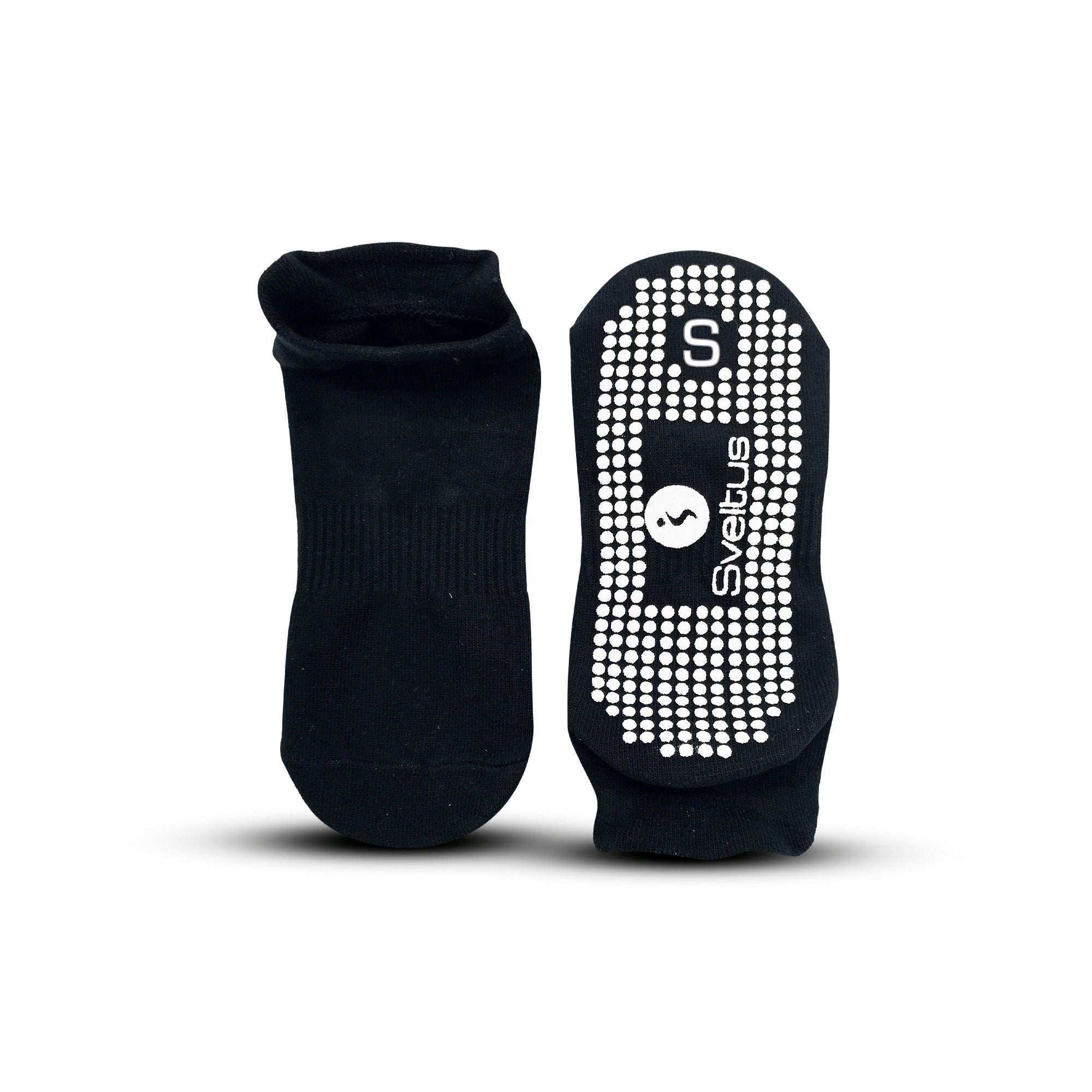 Chaussettes antidérapantes noires Sveltus avec picots pour fitness, yoga et pilates, assurant stabilité et confort.