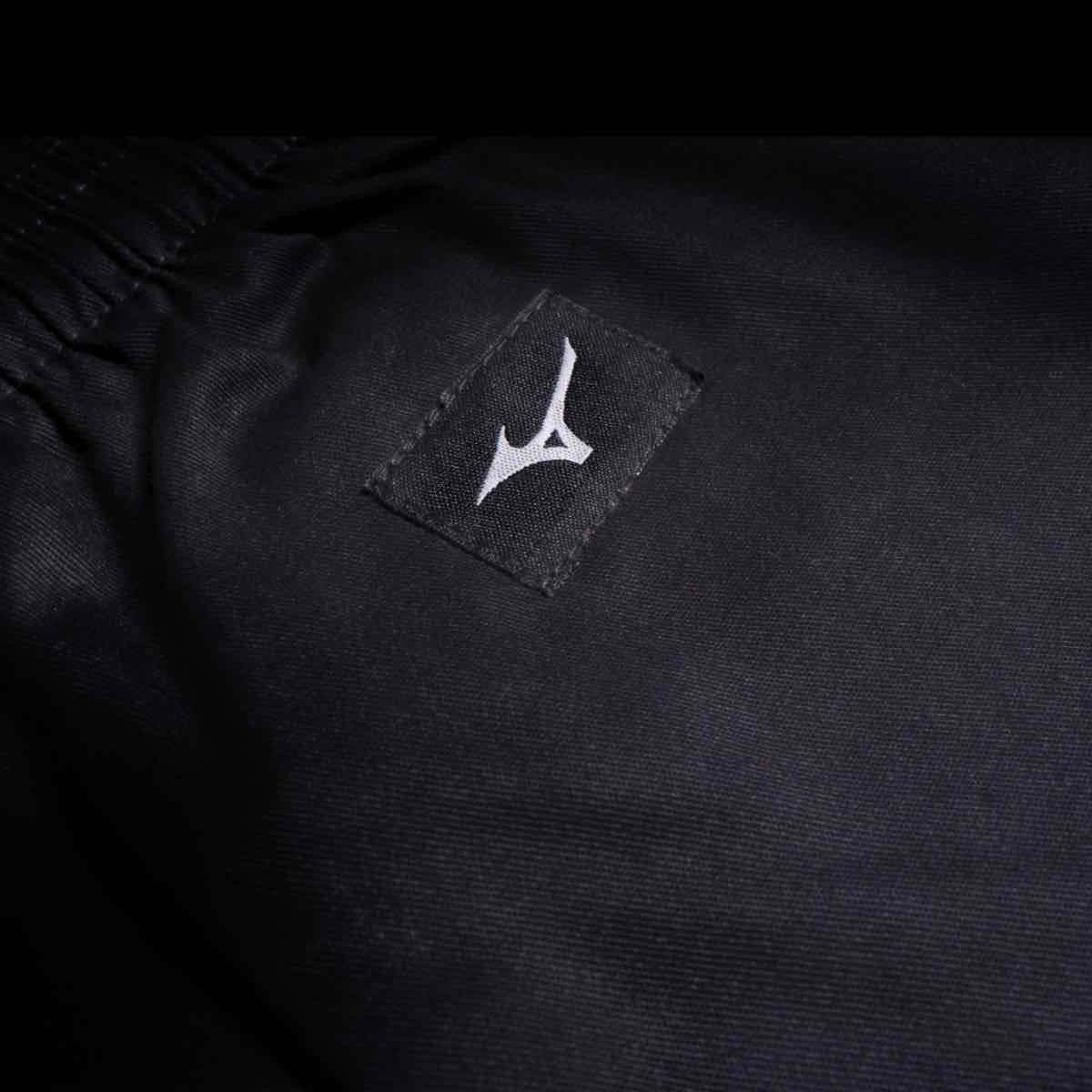 Bas large du pantalon Mizuno Kiai noir, toile poly-coton 200 g