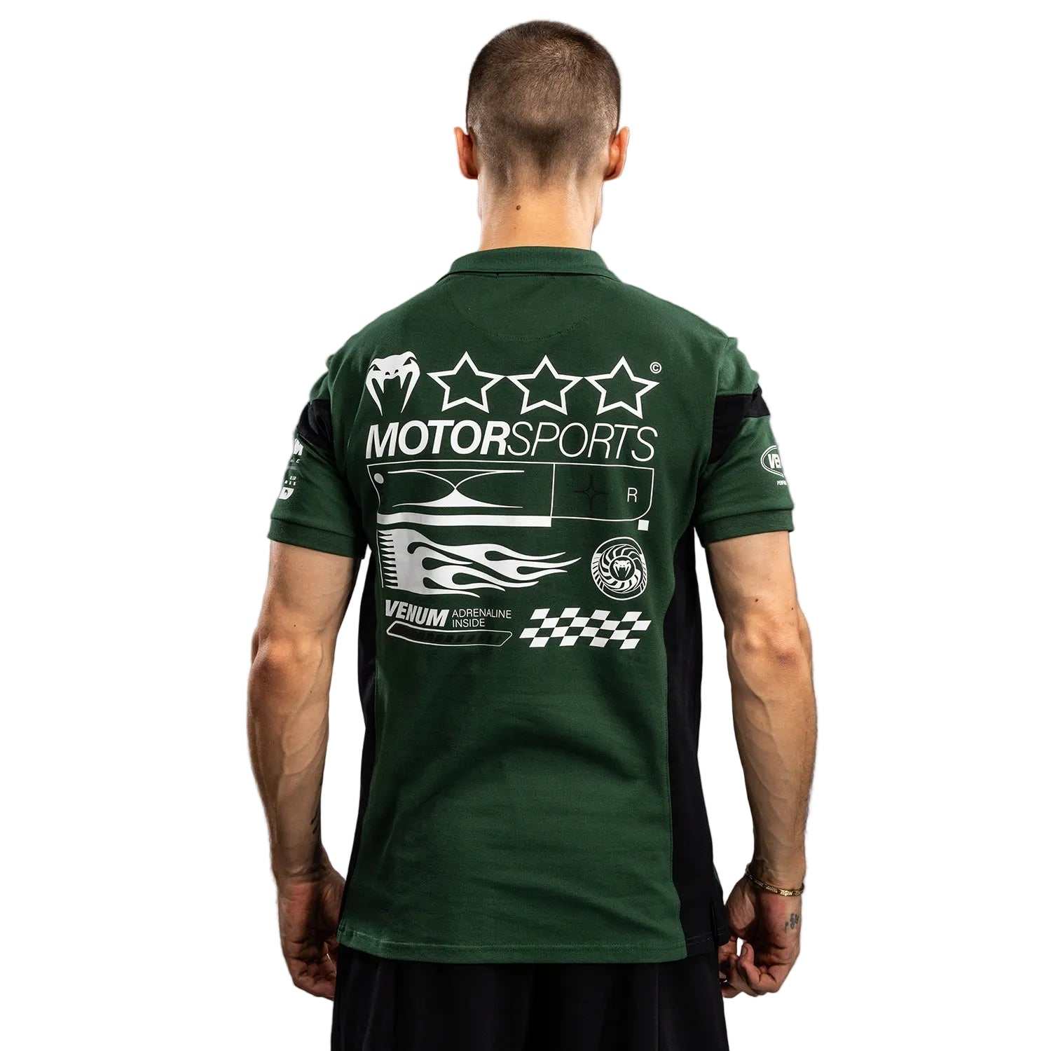 Polo Venum Motorsport vert profond en coton avec col zippé et patchs brodés