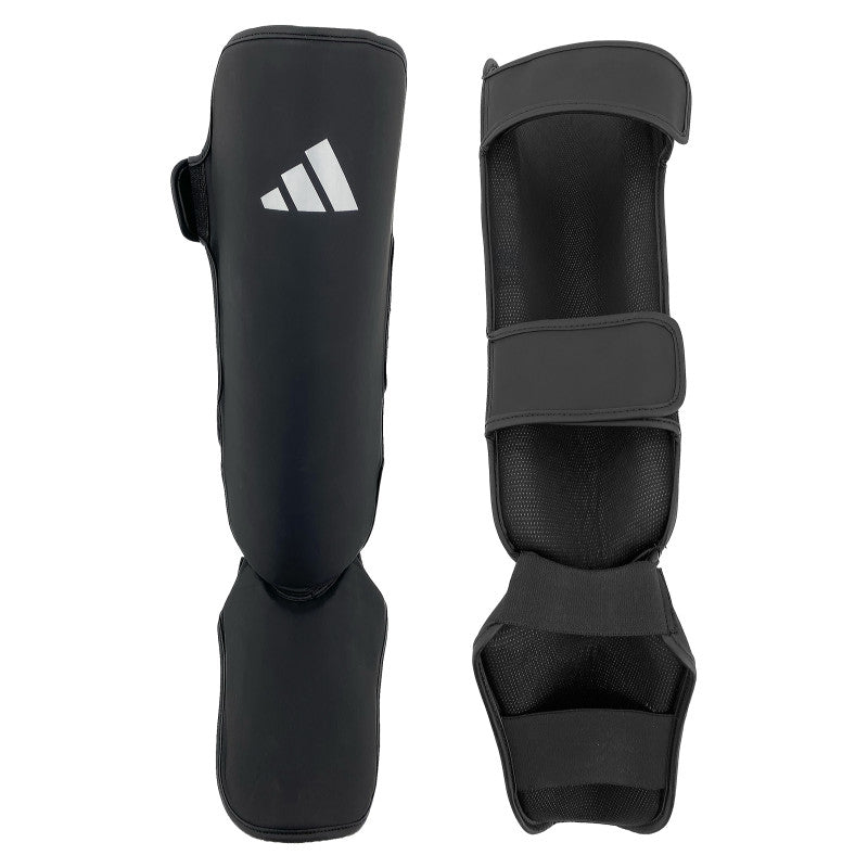 Paire de protège-tibias adidas Shin'N Step Pad, vue de face et de dos