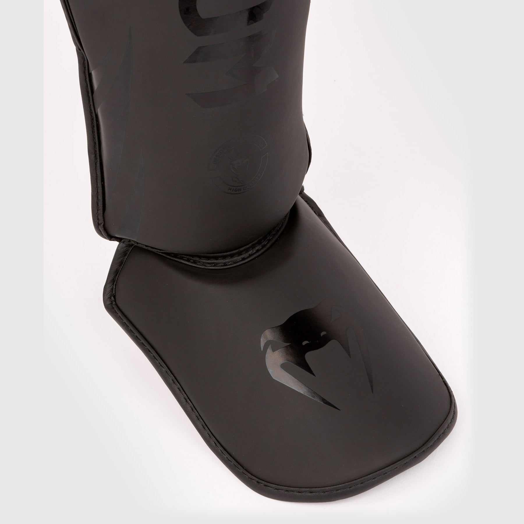 Protège-tibias enfant Venum Challenger noir pour boxe pieds-poings, mousse haute densité et maintien velcro