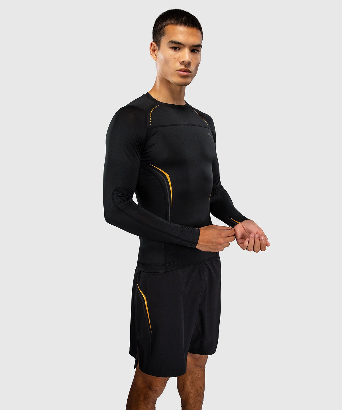 Rashguard manches longues Venum G-Core Noir/Or pour l'entraînement