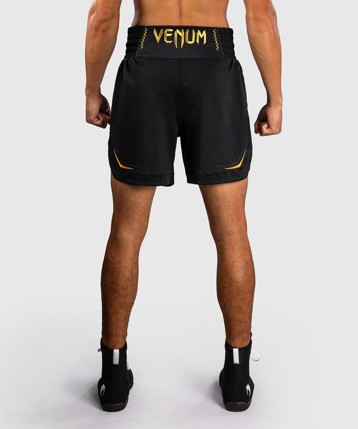 Short de boxe Venum G-Core Noir/Or pour l'entraînement