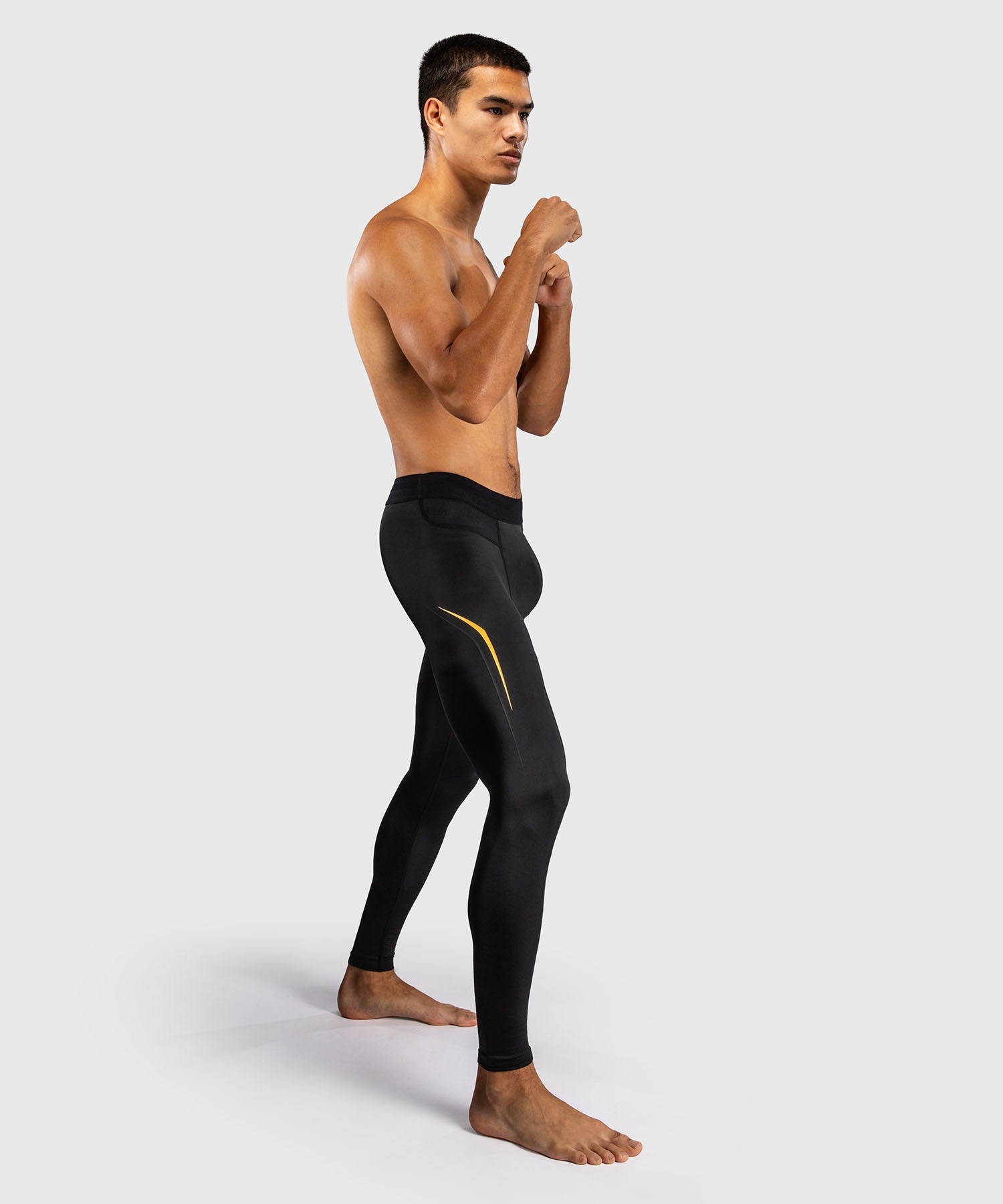Spats Venum G-Core Noir/Or pour l'entraînement