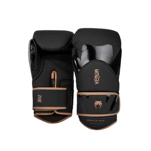 Gants de boxe Venum Challenger 4.0 noir et bronze en cuir synthétique avec mousse triple densité et maintien renforcé.